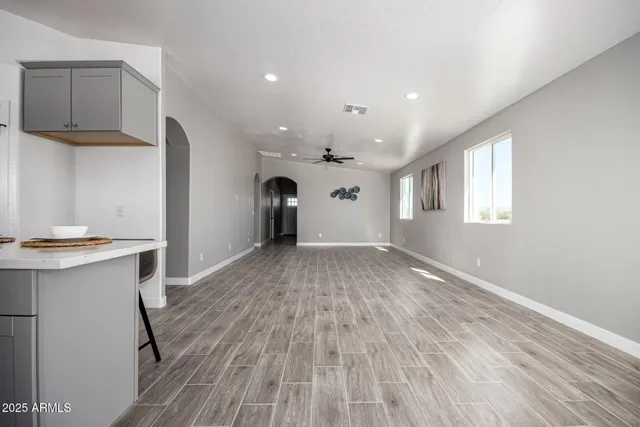 a view of room window and wooden floor