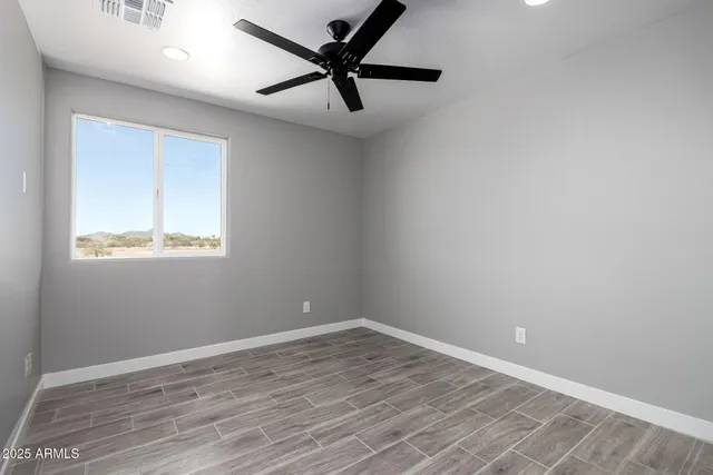 a view of an ocean and a mountain