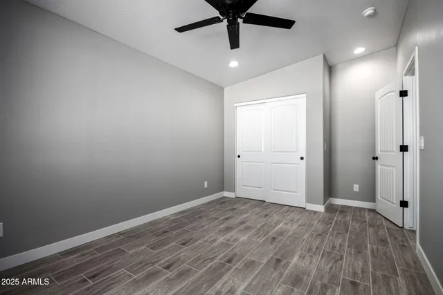 a view of a swimming pool with a table and chairs