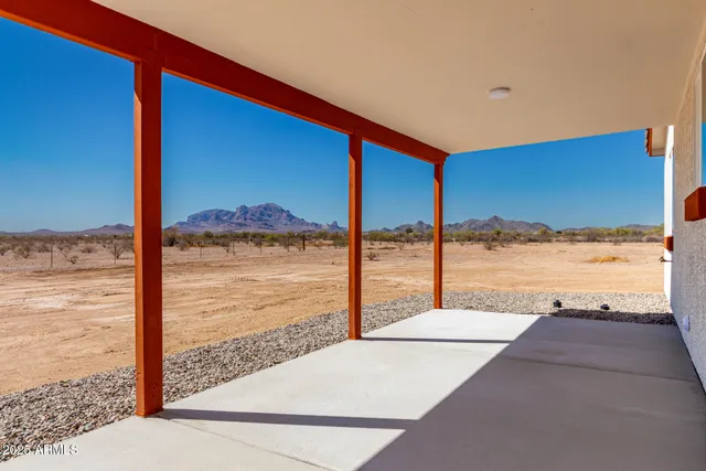 a view of a terrace with a ocean view