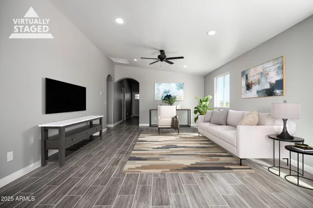 a view of a livingroom with a hardwood floor