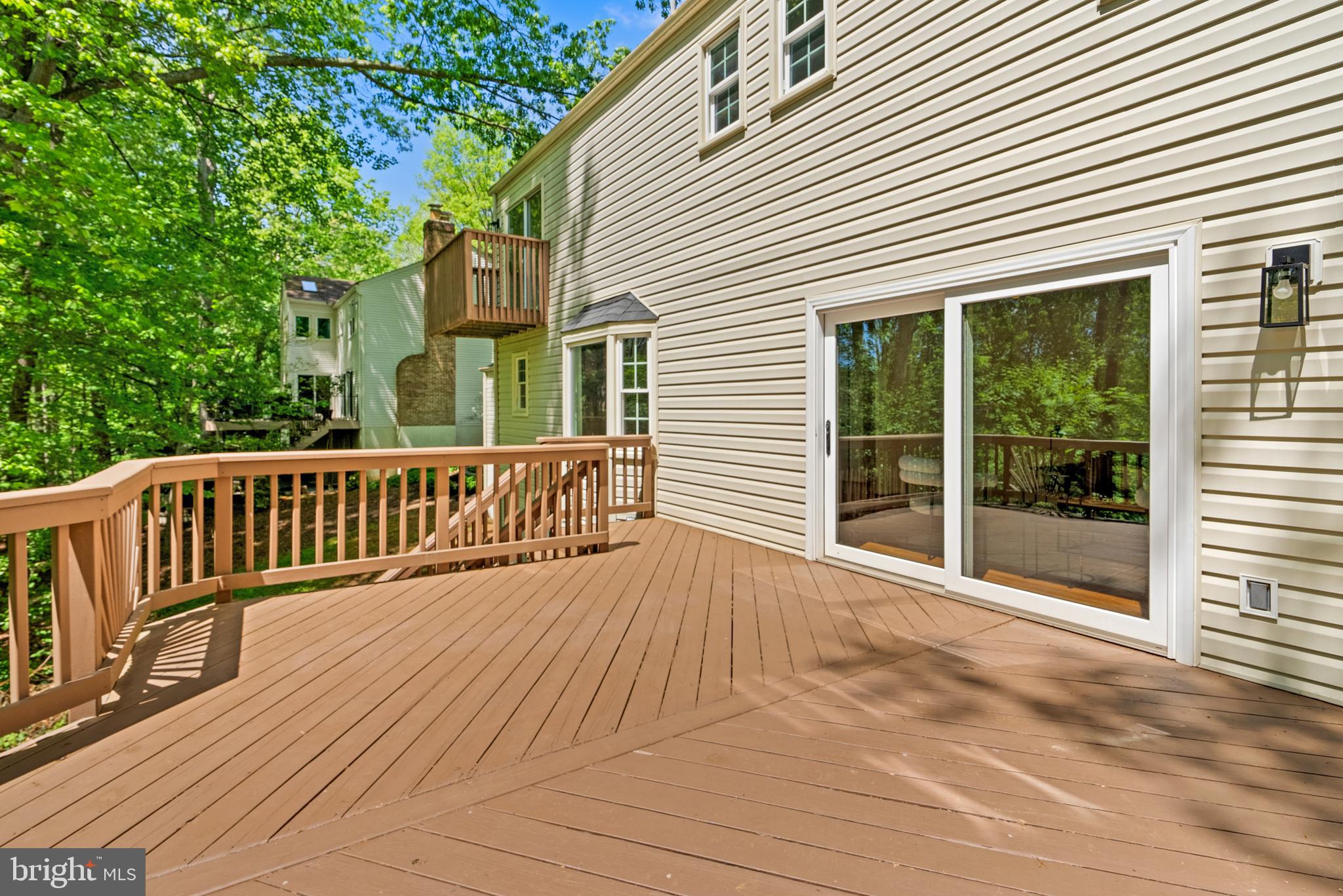 10717 Midsummer Drive Reston, VA 20191 - Photo 33 of 35 a view of a house with wooden deck