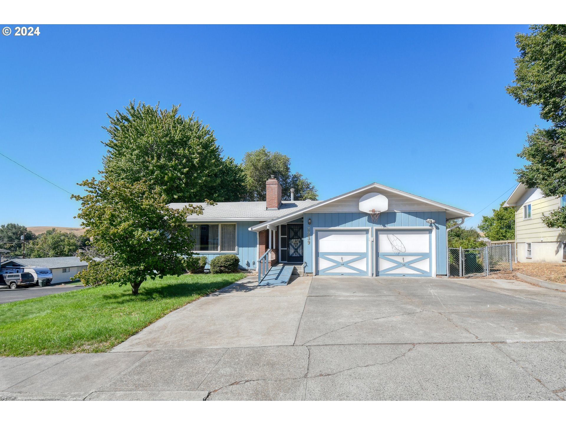 3239 Southwest Isaac Avenue Pendleton, OR 97801 - Photo 1 of 42 a front view of a house with a yard