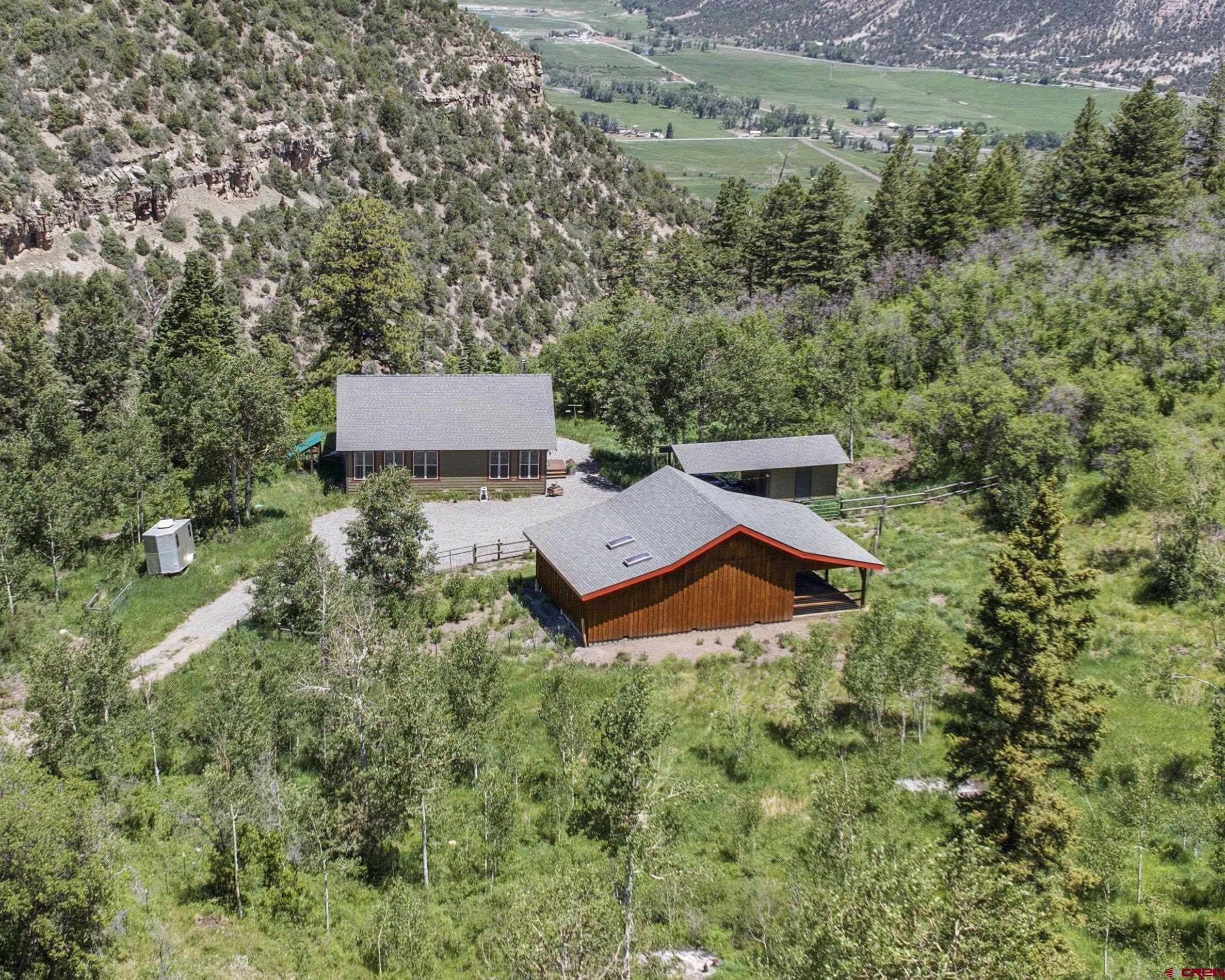 444 Which Way Ridgway, CO 81432 - Photo 33 of 36 an aerial view of a house with yard