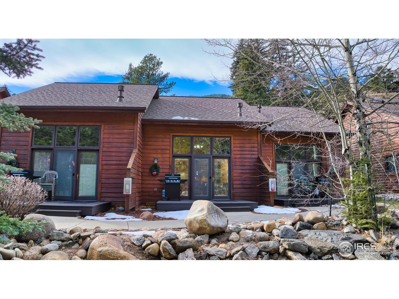 Steps from the banks of Fall River and just minutes from the North Entrance of Rocky Mountain National Park, this one-bedroom, one-bathroom condo offers a rare opportunity to own a hands-free, income-producing short-term rental in the heart of Estes Park.