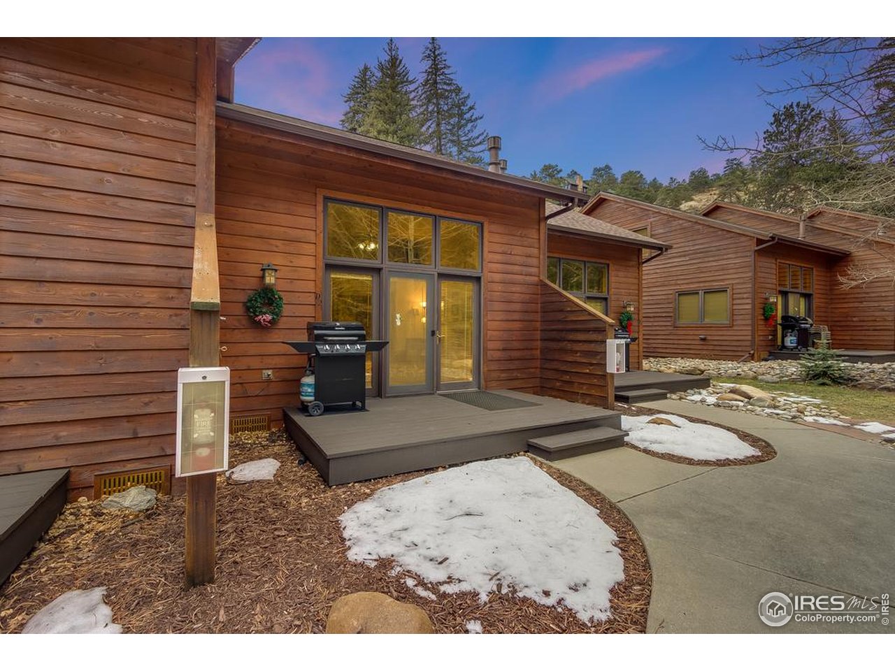 2120 Fall River Road, Unit 2 Estes Park, CO 80517 - Photo 3 of 44 Step off the front porch and onto the banks of Fall River.
