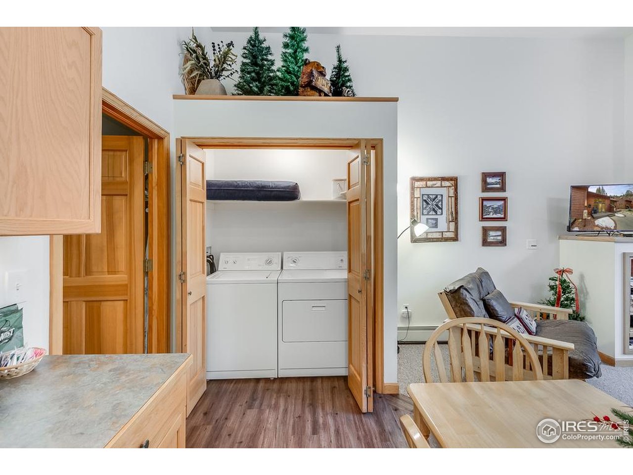 2120 Fall River Road, Unit 2 Estes Park, CO 80517 - Photo 33 of 44 includes laundry closet with washer and dryer