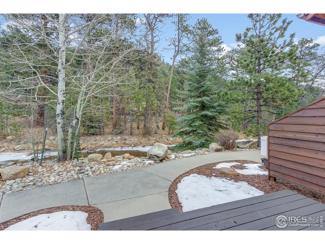 2120 Fall River Road, Unit 2 Estes Park, CO 80517 - Photo 35 of 44 Listen to Fall River while relaxing on the private deck.