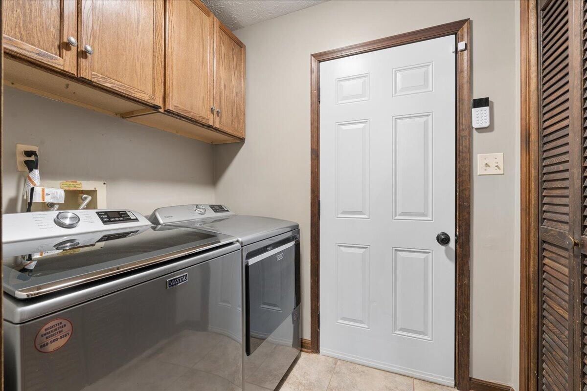 431 Langdon Road Evington, VA 24550 - Photo 22 of 54 a kitchen with stainless steel appliances granite countertop a sink and cabinets