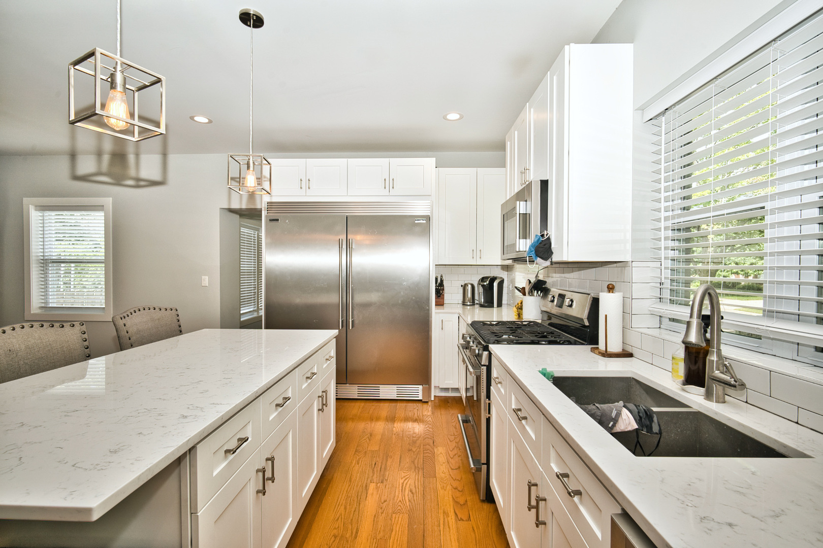 643 Oriole Avenue Park Ridge, IL 60068 - Photo 11 of 31 a kitchen with stainless steel appliances granite countertop a sink a stove and refrigerator