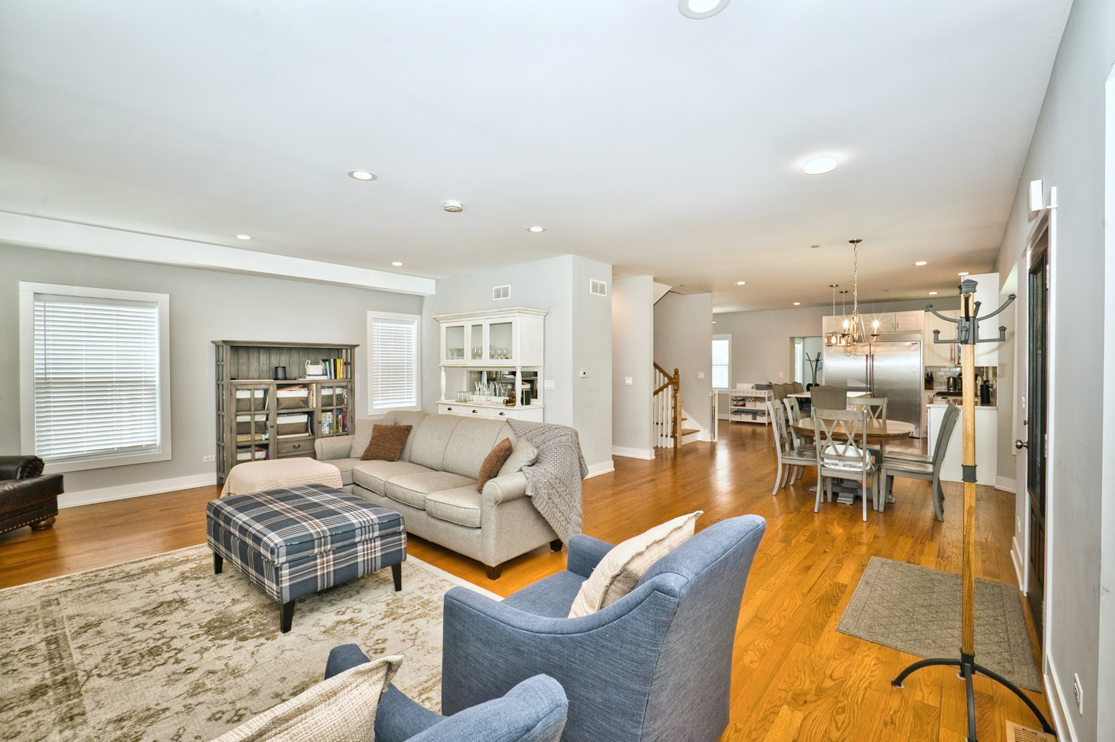 643 Oriole Avenue Park Ridge, IL 60068 - Photo 19 of 31 a living room with furniture wooden floor and a view of kitchen
