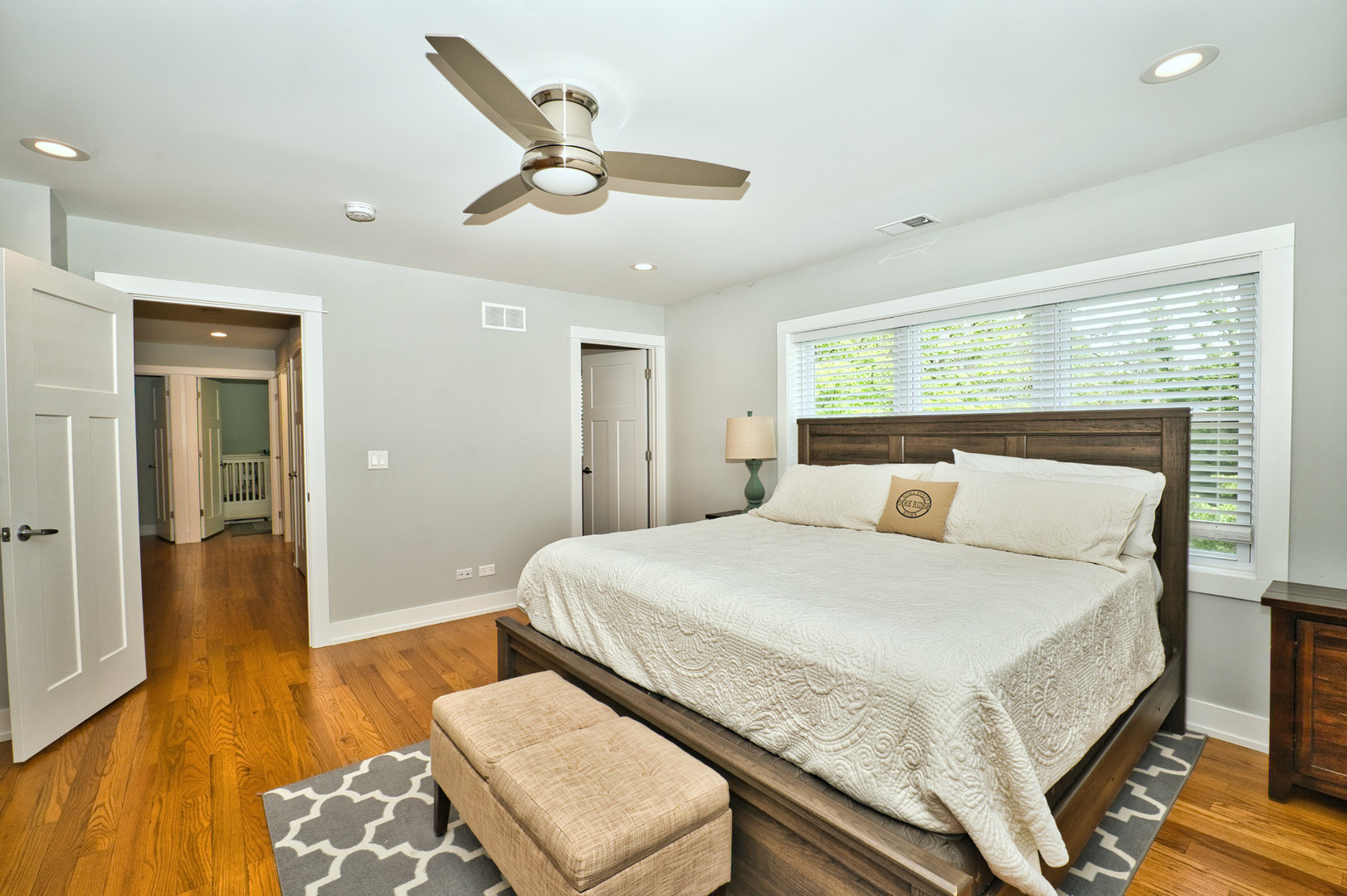643 Oriole Avenue Park Ridge, IL 60068 - Photo 20 of 31 a bedroom with a bed and wooden floor