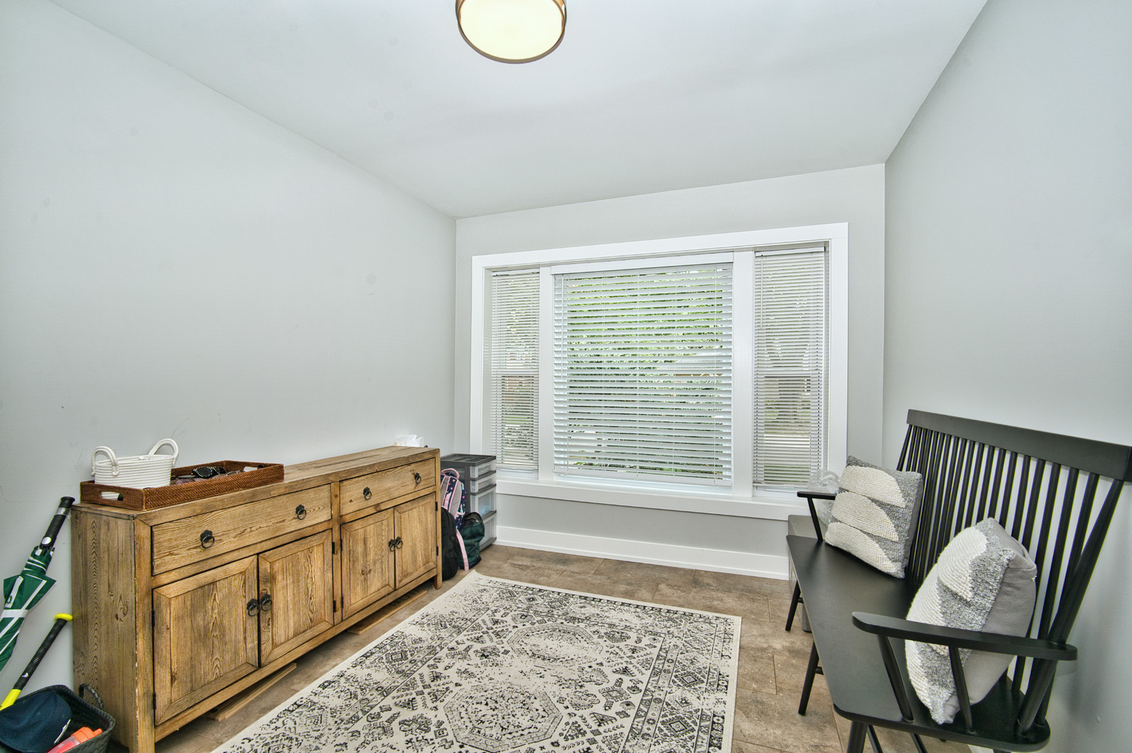 643 Oriole Avenue Park Ridge, IL 60068 - Photo 3 of 31 a bedroom with furniture and a window