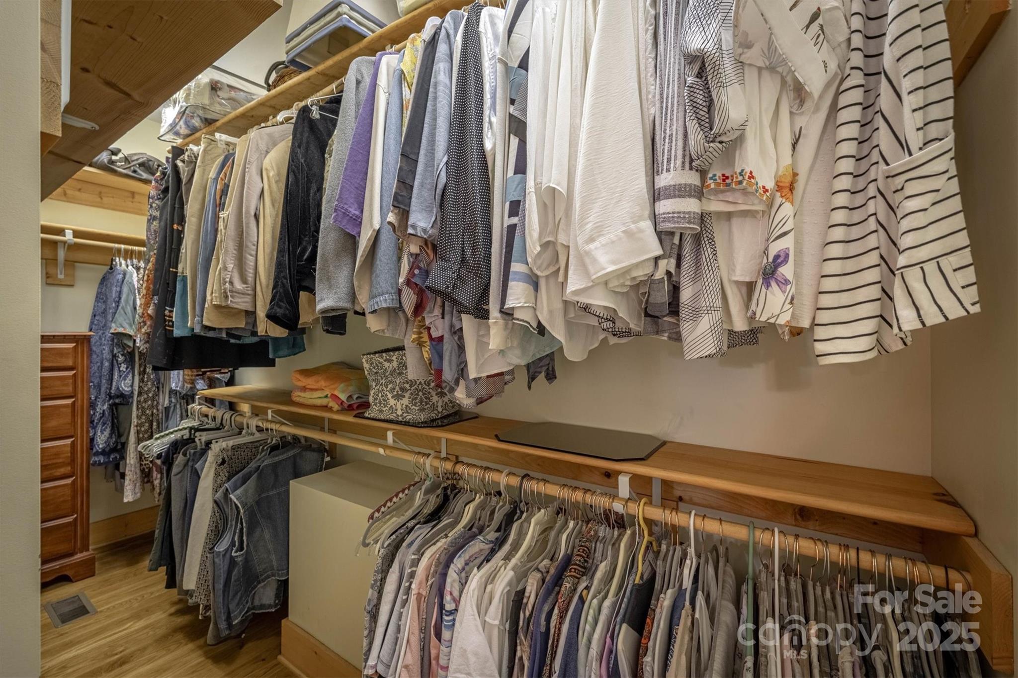 4030 South View Boulevard Morganton, NC 28655 - Photo 21 of 43 a view of walk in closet with clothes and shoes