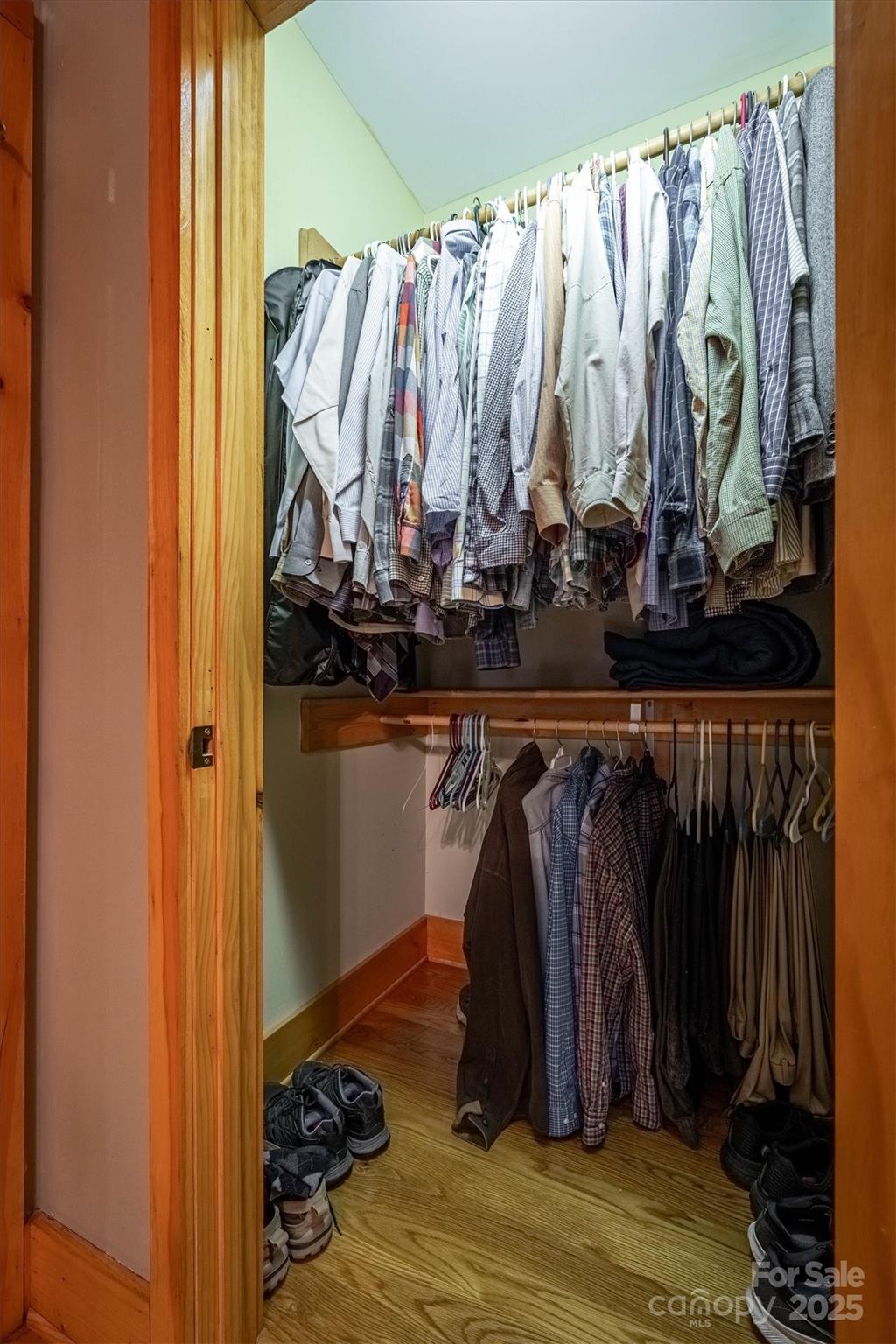 4030 South View Boulevard Morganton, NC 28655 - Photo 29 of 43 a view of walk in closet with clothes and shoes