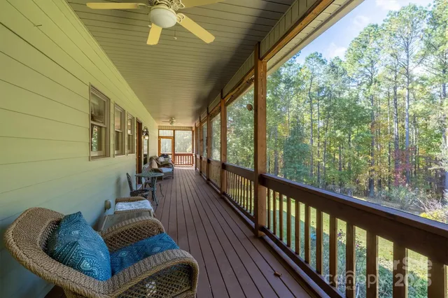 a view of balcony with furniture