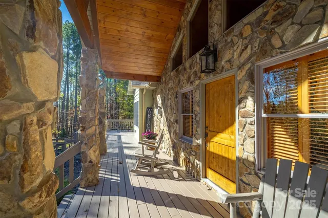 a view of a patio with glass windows