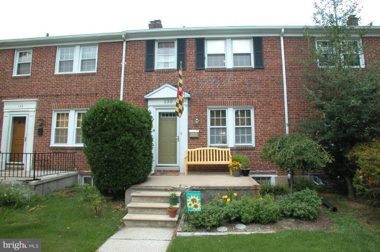 130 Murdock Road Baltimore, MD 21212 - Photo 1 of 16 a front view of a house with a yard