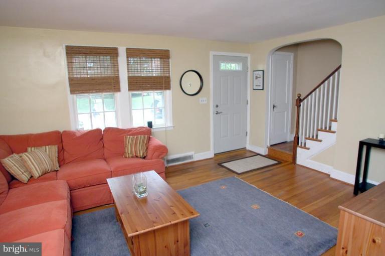 130 Murdock Road Baltimore, MD 21212 - Photo 3 of 16 a living room with furniture and a window