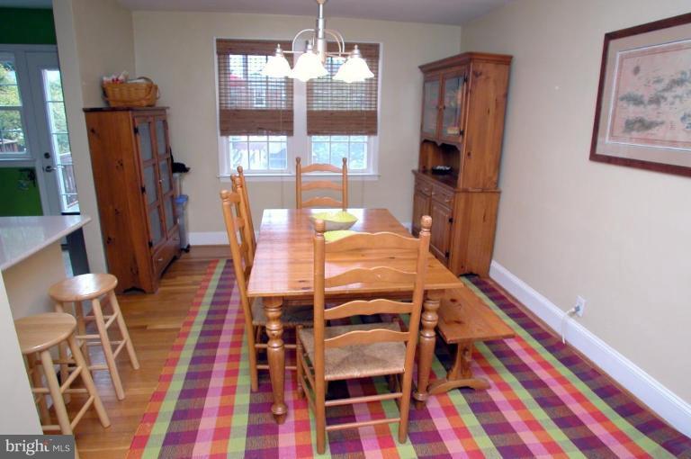 130 Murdock Road Baltimore, MD 21212 - Photo 4 of 16 a view of a dining room with furniture and chandelier kitchen view