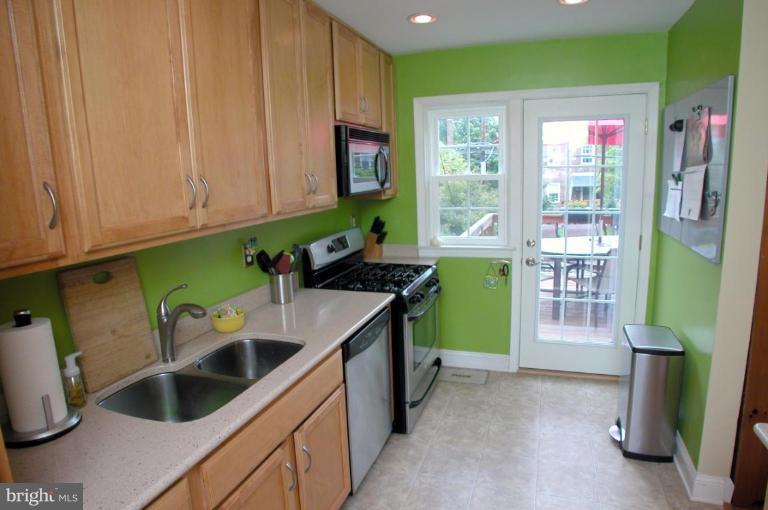 130 Murdock Road Baltimore, MD 21212 - Photo 6 of 16 a kitchen with sink and cabinets