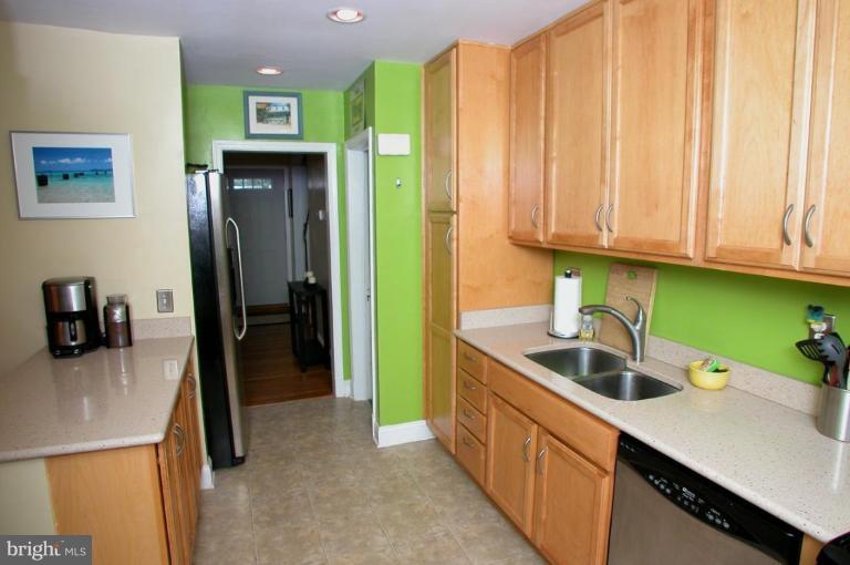 130 Murdock Road Baltimore, MD 21212 - Photo 7 of 16 a kitchen with stainless steel appliances granite countertop a refrigerator and a sink