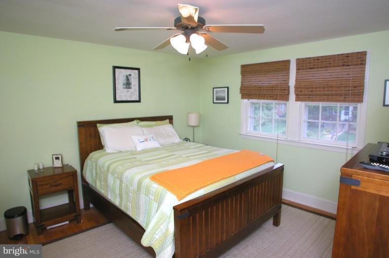 130 Murdock Road Baltimore, MD 21212 - Photo 10 of 16 a bedroom with a bed and a window