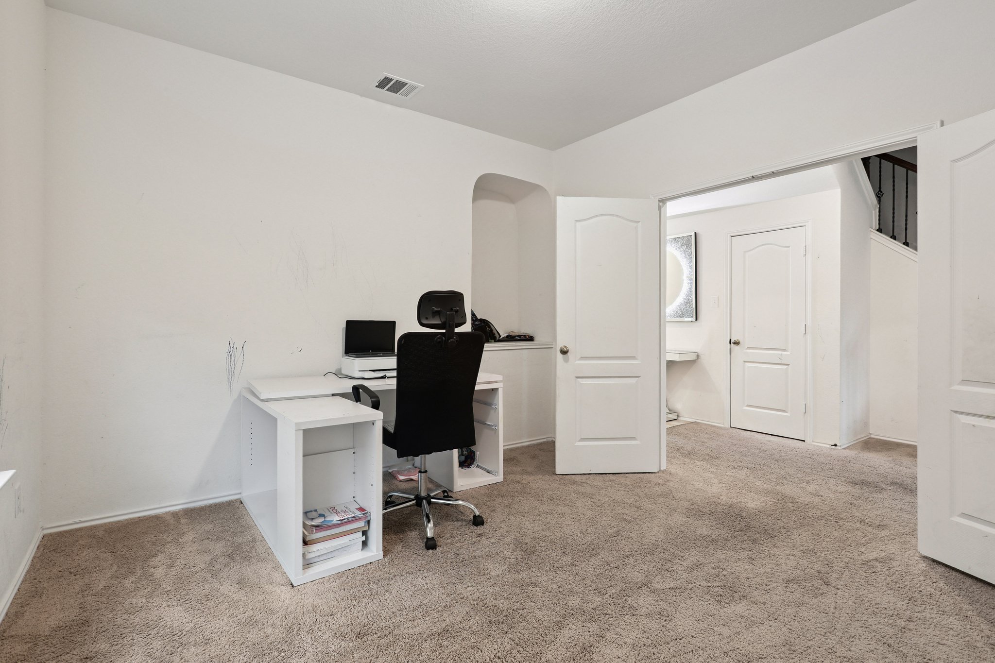 13817 Eleanor Roosevelt Street Manor, TX 78653 - Photo 5 of 35 a view of a workspace with furniture