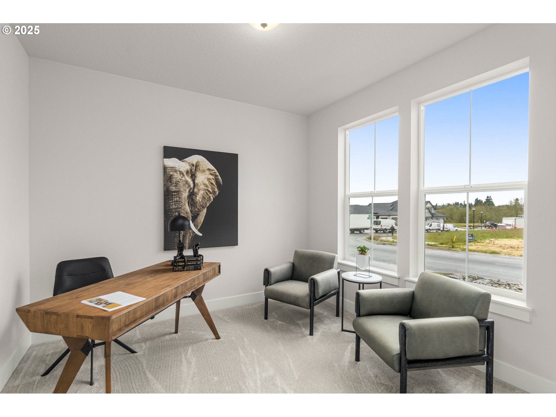 4117 South 14th Way Ridgefield, WA 98642 - Photo 5 of 20 a living room with furniture a table and a large window