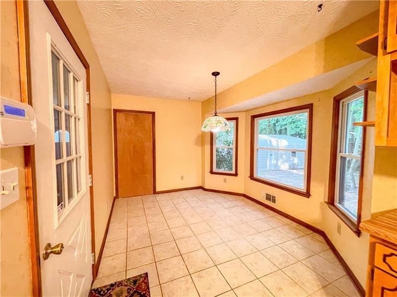 111 Libby Lane Stockbridge, GA 30281 - Photo 12 of 30 a view of an empty room with a window