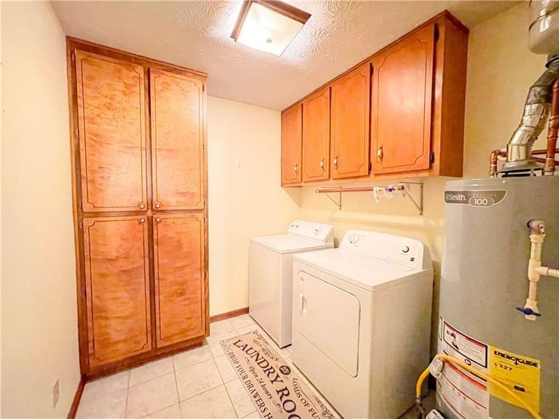 111 Libby Lane Stockbridge, GA 30281 - Photo 13 of 30 a utility room with dryer and washer