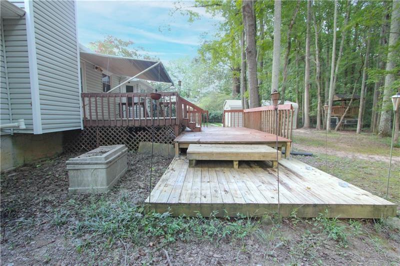 111 Libby Lane Stockbridge, GA 30281 - Photo 25 of 30 a view of house with yard and entertaining space