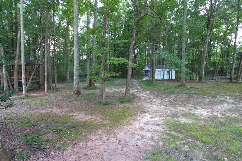 111 Libby Lane Stockbridge, GA 30281 - Photo 27 of 30 a view of a house with a backyard