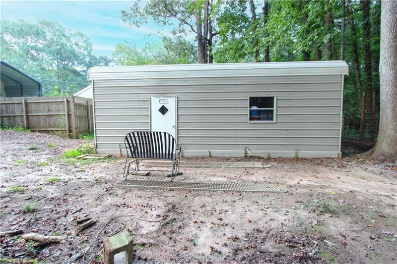 111 Libby Lane Stockbridge, GA 30281 - Photo 28 of 30 a view of a house with a yard