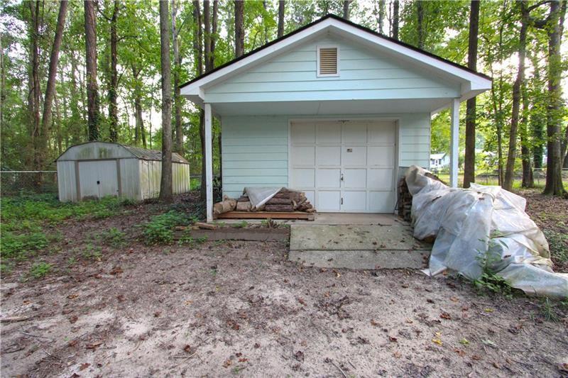 111 Libby Lane Stockbridge, GA 30281 - Photo 29 of 30 a view of a small house with yard