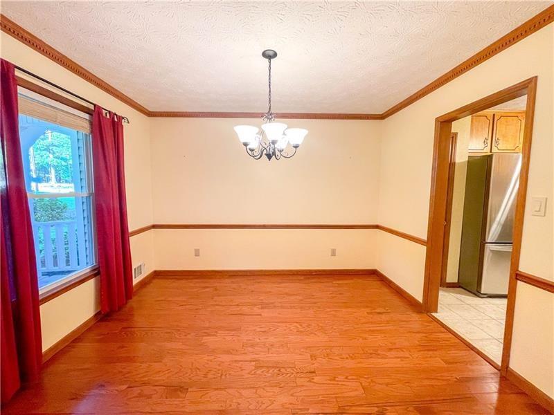 111 Libby Lane Stockbridge, GA 30281 - Photo 7 of 30 a view of an empty room with a window