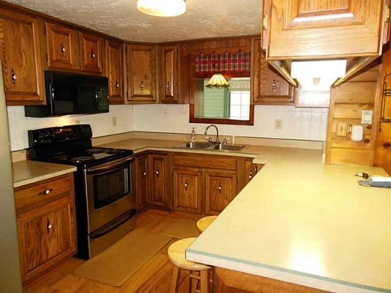 951 Wolfe Road Indiana, PA 15701 - Photo 2 of 25 Kitchen. Country Kitchen with stainless steel appliances. Breakfast bar/extra counter space for cooking. Eat in as well!