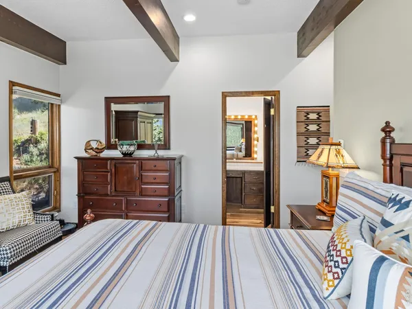 a bedroom with a bed and furniture