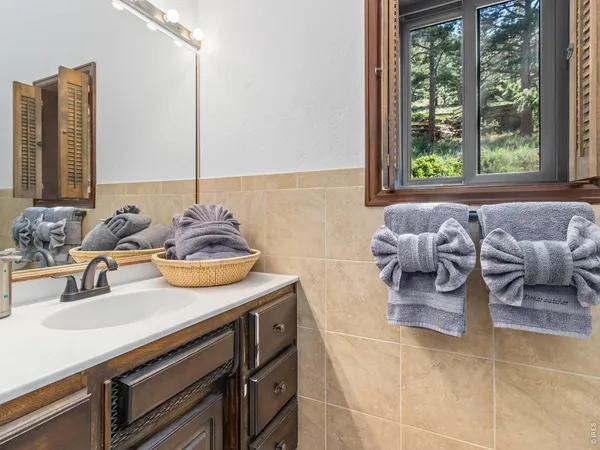a kitchen with a sink and a window