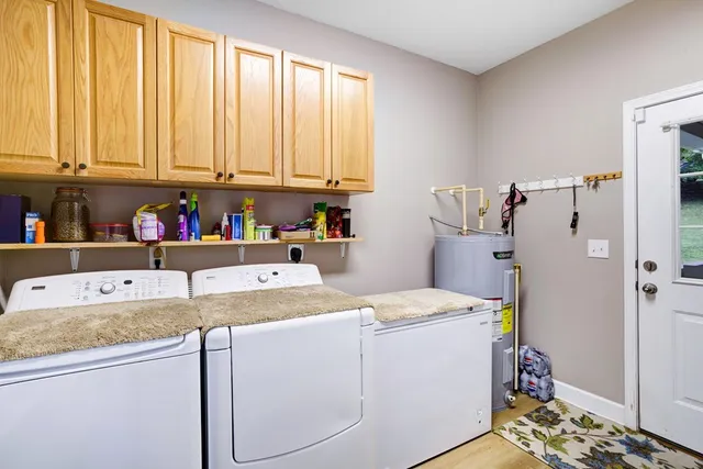 a utility room with washer and dryer