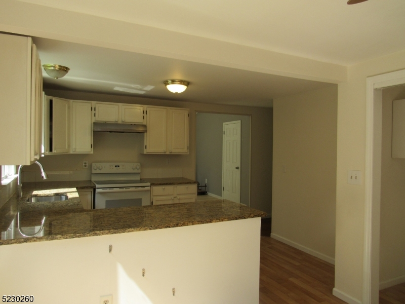 275 Creek Road Frenchtown, NJ 08825 - Photo 13 of 27 a kitchen with sink and a refrigerator