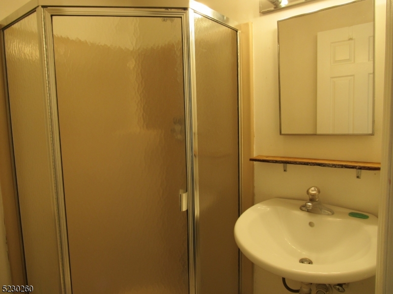 275 Creek Road Frenchtown, NJ 08825 - Photo 9 of 27 a bathroom with a sink and a mirror