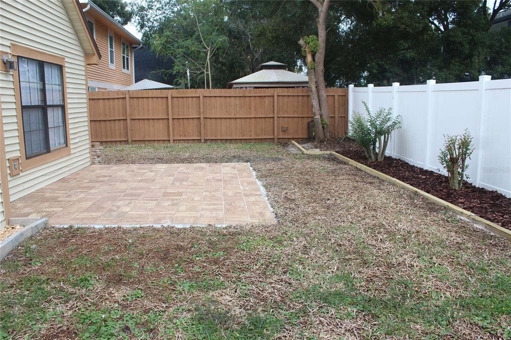 9869 Aloma Bend Lane Oviedo, FL 32765 - Photo 13 of 15 a view of a backyard