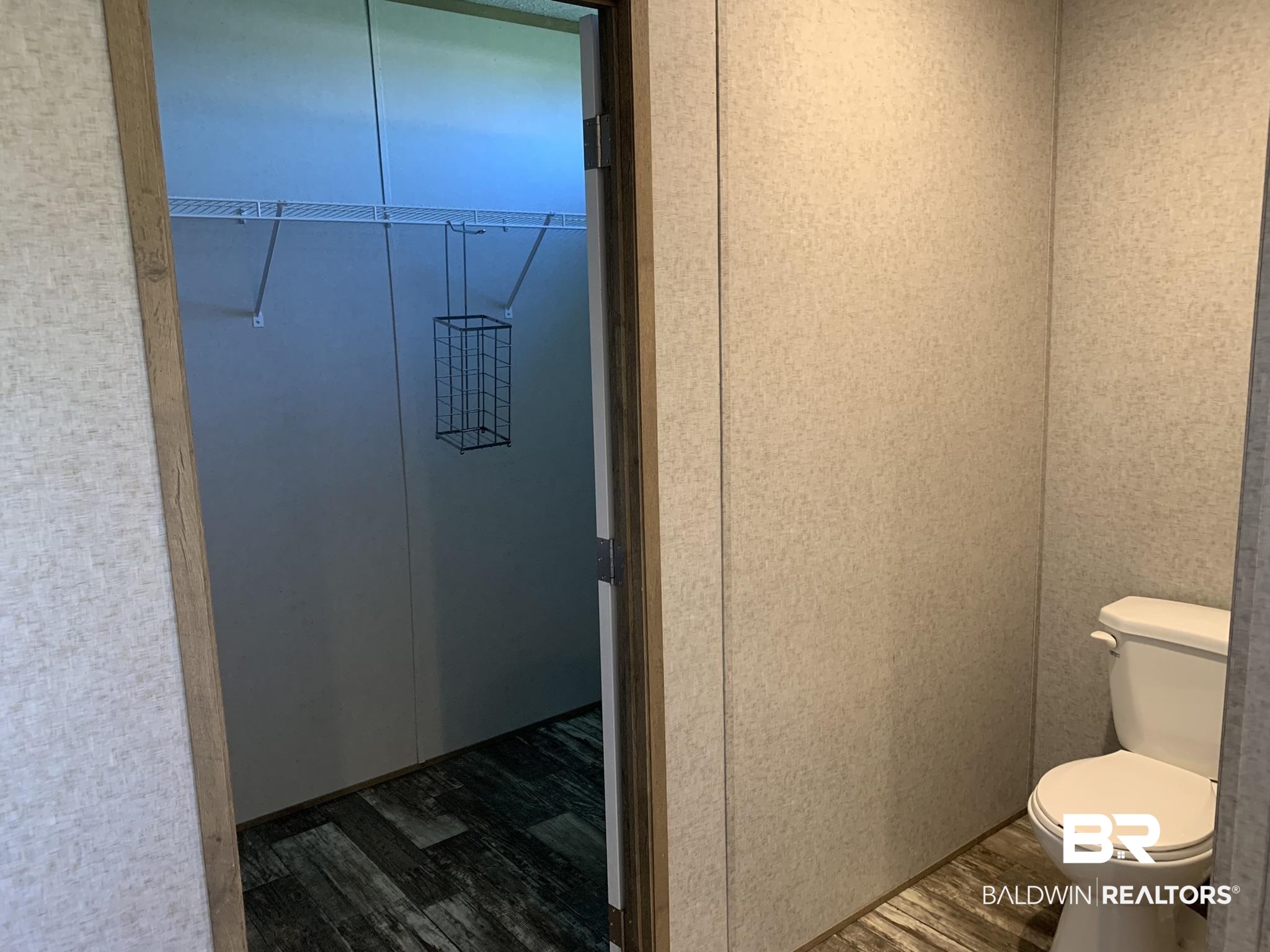 16876 County Road 87 Elberta, AL 36530 - Photo 5 of 13 Bathroom with hardwood / wood-style flooring and toilet