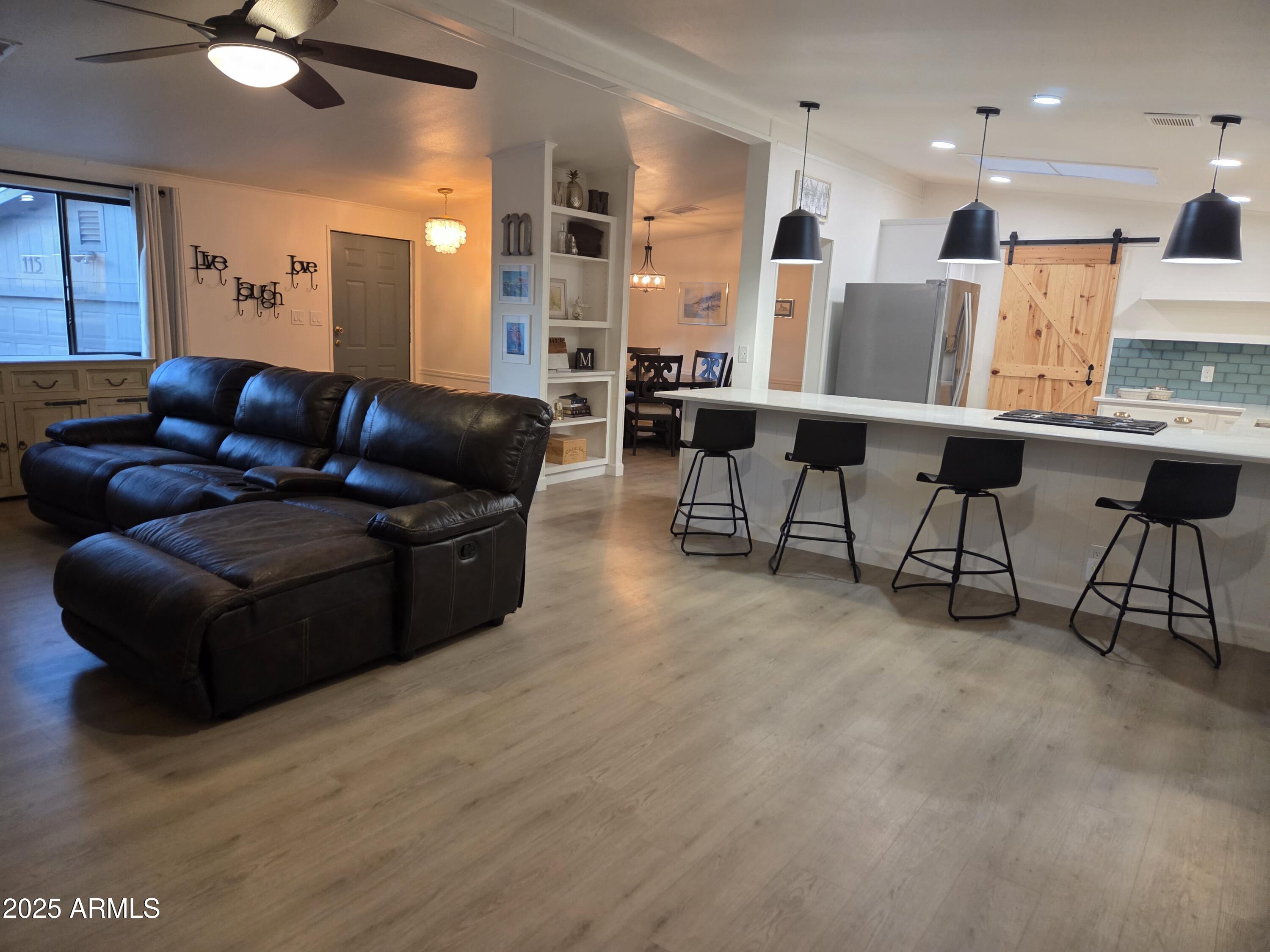 115 South Young Road Payson, AZ 85541 - Photo 7 of 34 a living room with furniture and a large window