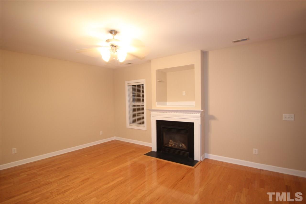 3112 Trassacks Drive Raleigh, NC 27610 - Photo 2 of 13 a view of empty room with fireplace