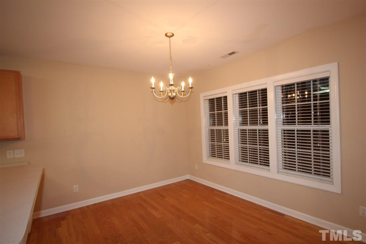 3112 Trassacks Drive Raleigh, NC 27610 - Photo 5 of 13 a view of empty room with windows