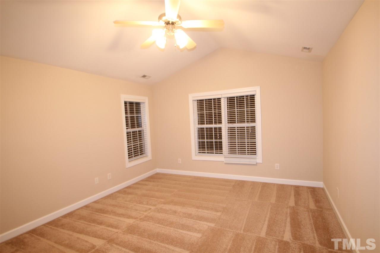 3112 Trassacks Drive Raleigh, NC 27610 - Photo 10 of 13 a view of an empty room with a window