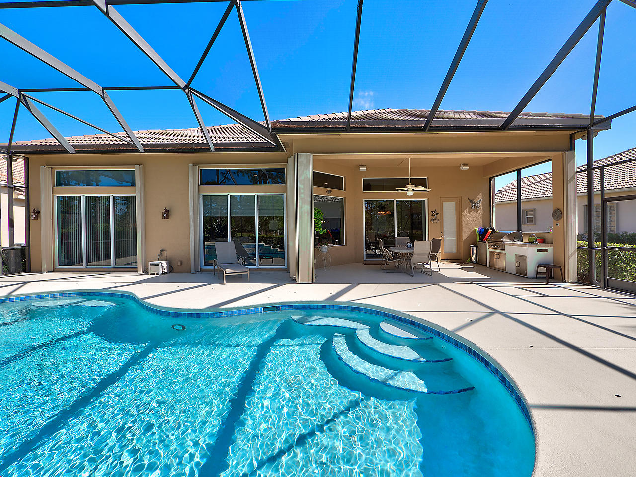 8633 Tompson Point Road Port St. Lucie, FL 34986 - Photo 23 of 31 Covered Patio & Pool