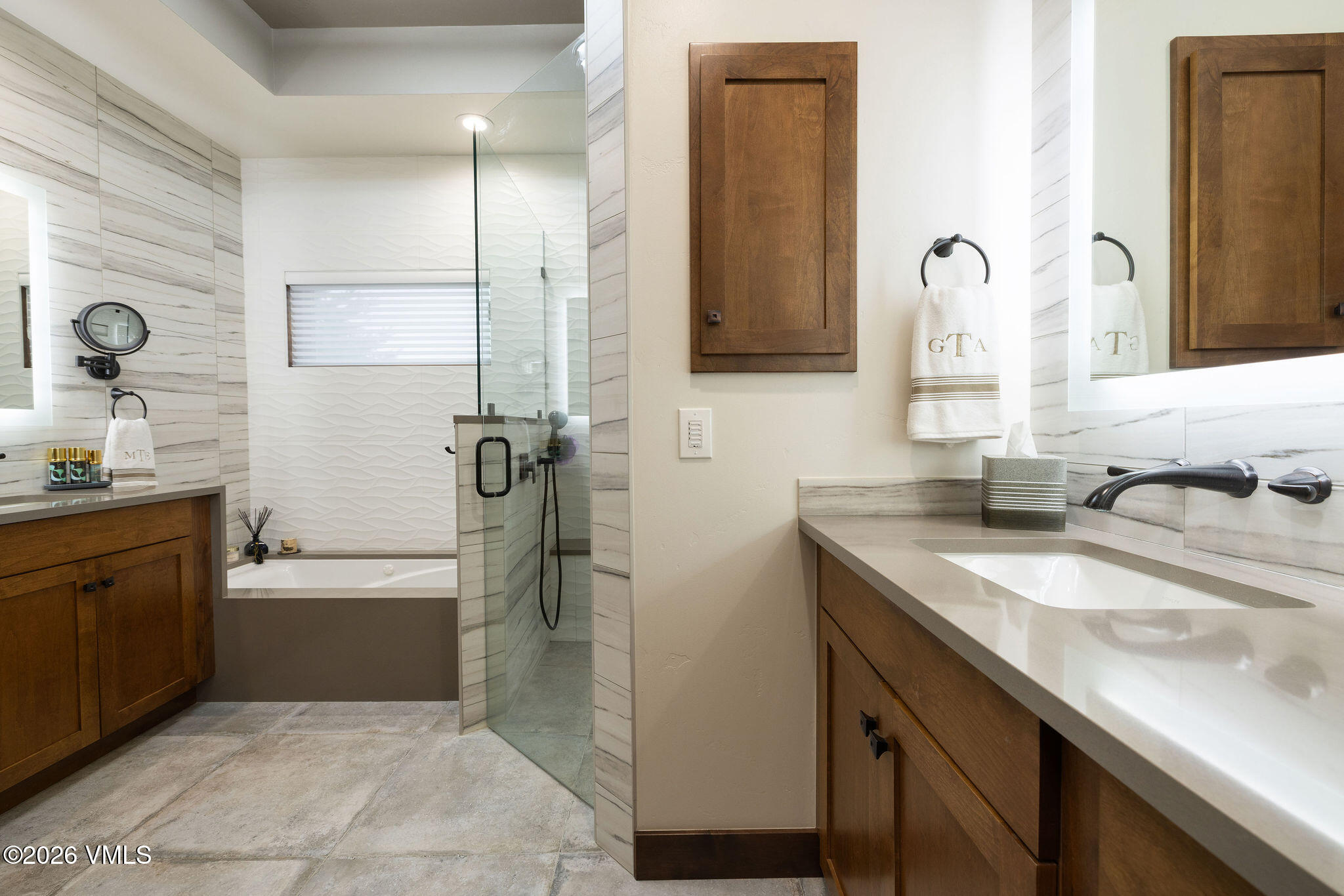 150 Buckboard Road Edwards, CO 81632 - Photo 12 of 27 a bathroom with a granite countertop sink and a mirror